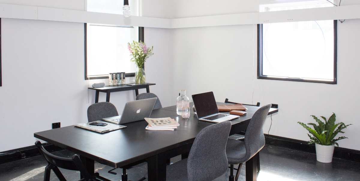 A beautiful conference room with laptops